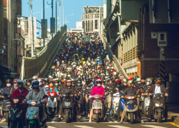 Taipei waterfall scooter © Richie Chan | Dreamstime.com