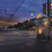 Night traffic scene at intersection with traffic cabinet on fire next to traffic lights (image: Prime Global Publishing)