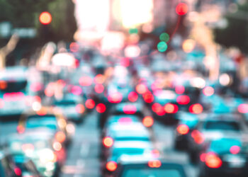 Blurred picture of cars in traffic jam, facing away from camera (image: Mirko Vitali/Dreamstime.com)