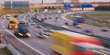 Trucks blur into view on crowded German autobahn (image: Manwolste/Dreamstime.com)